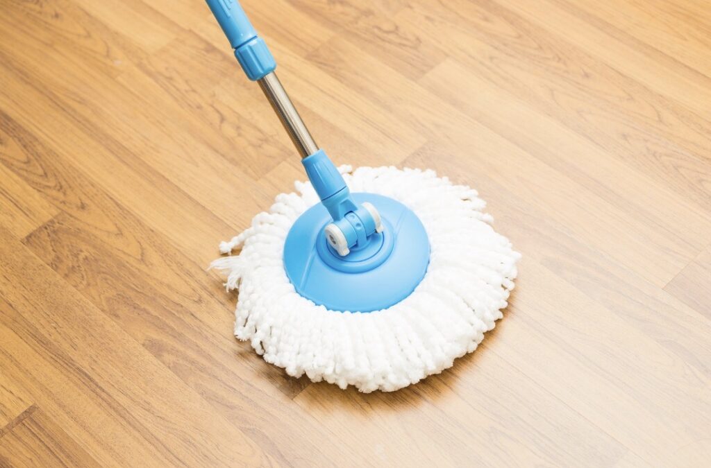 clean wood floor with mop